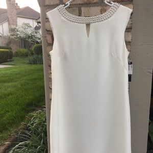 Cream dress with pearl details